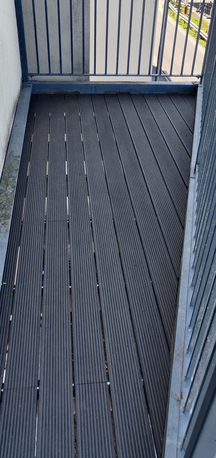 Balcony after: new grey composite decking