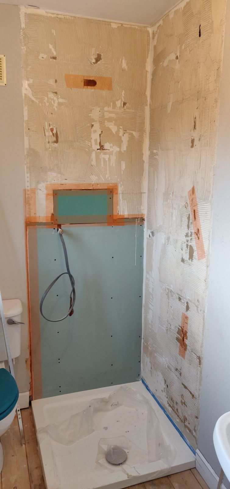 New moisture-resistant boards and shower tray fitted