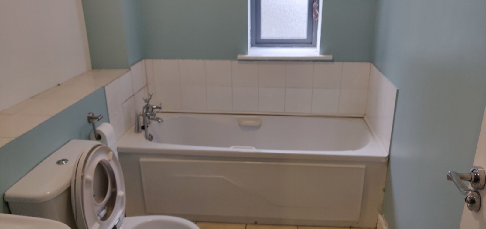 The same bathroom before the refit