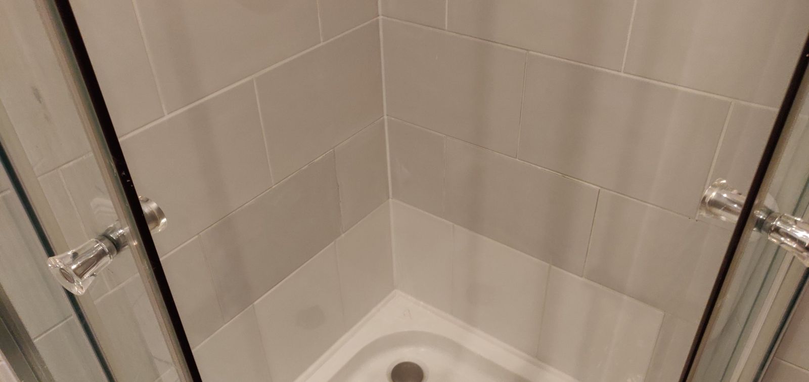 Shower after: retiled and resealed corner