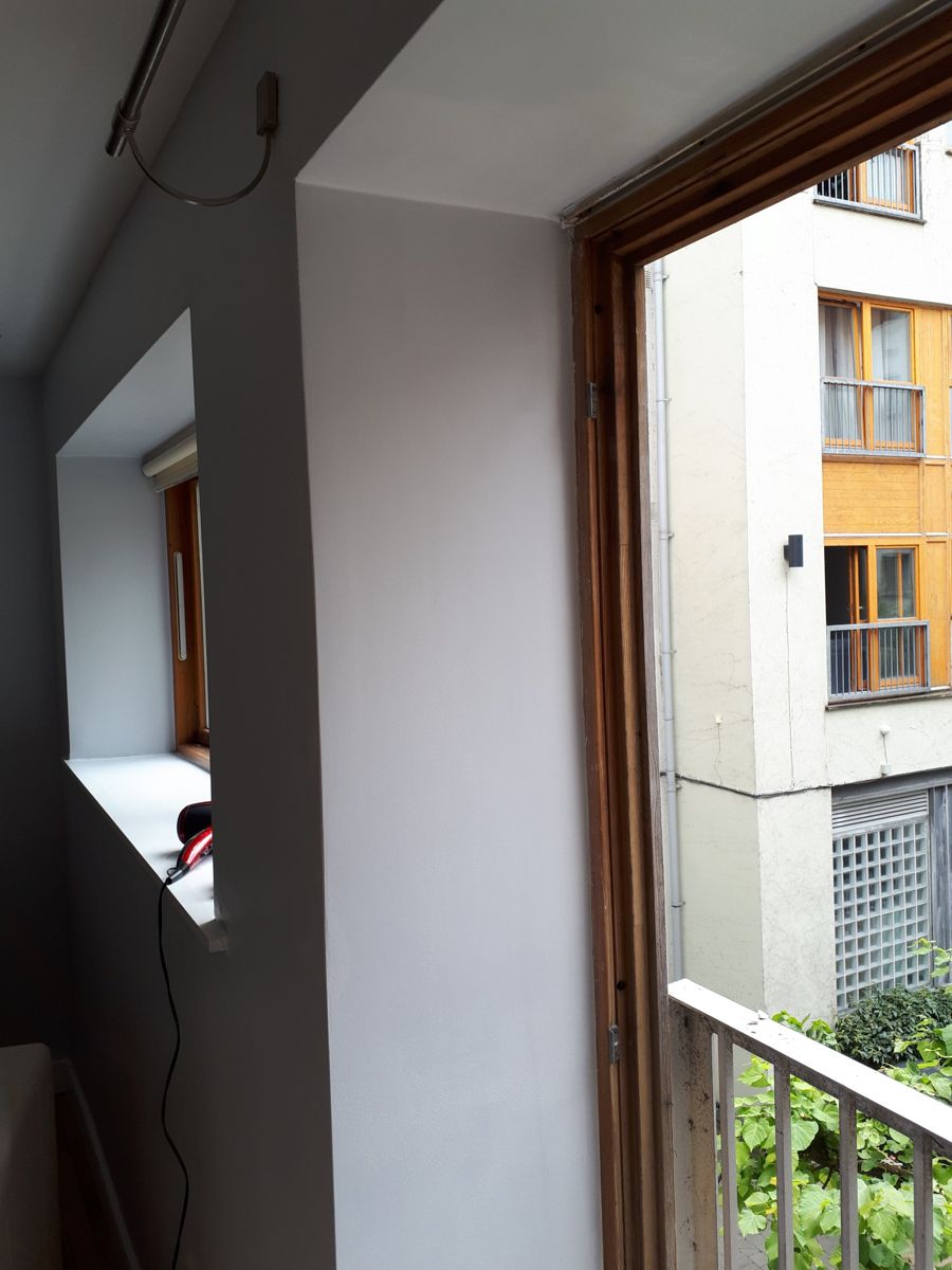 Cracked wall repaired and repainted